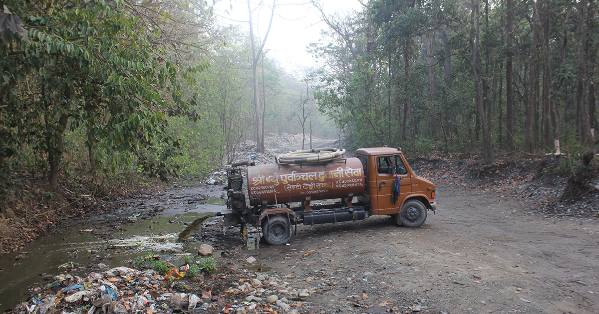 A private septic tank collector dumps wastewater in the open in Dharan. (File Photo: February 2020)